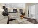 Bright living room features hardwood floors, modern décor, and an open concept design at 1813 Glenbay Ct, Windermere, FL 34786