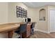 Home office with built-in desks, two chairs, ample storage, and an arched display niche at 1813 Glenbay Ct, Windermere, FL 34786