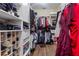Spacious walk-in closet with custom shelving and racks for storage at 1813 Glenbay Ct, Windermere, FL 34786