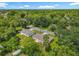 Aerial view showcasing homes amidst lush greenery, providing a serene setting at 1816 Alexander Ave, Sanford, FL 32771