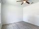 Clean bedroom featuring wood-look flooring and neutral paint at 1816 Alexander Ave, Sanford, FL 32771