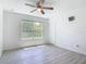 Bedroom featuring wood-look flooring and plenty of natural light at 1816 Alexander Ave, Sanford, FL 32771