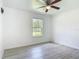 Light-filled bedroom featuring wood-look floors and a window with views at 1816 Alexander Ave, Sanford, FL 32771