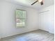 Bedroom with large window and closet at 1816 Alexander Ave, Sanford, FL 32771
