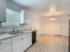 Kitchen featuring updated countertops, stainless steel sink, and stainless steel appliances at 1816 Alexander Ave, Sanford, FL 32771