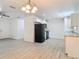 Open-concept space with hardwood floors and ample seating area at 1816 Alexander Ave, Sanford, FL 32771