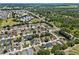 Wide aerial shot of the community, showcasing the homes, landscaping, and surrounding greenery at 1905 Emily Blvd, Winter Haven, FL 33884