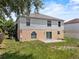 Back exterior of the home, highlighting the outdoor space and exterior design at 1905 Emily Blvd, Winter Haven, FL 33884
