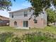Backyard has a patio and lawn at 1905 Emily Blvd, Winter Haven, FL 33884