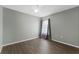 Inviting bedroom with vinyl flooring, natural light, and a ceiling fan at 1905 Emily Blvd, Winter Haven, FL 33884