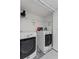 Functional laundry room with modern washer and dryer units at 1905 Emily Blvd, Winter Haven, FL 33884