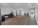 Bright living room featuring neutral carpet, modern curtains, and ample space for gatherings at 1905 Emily Blvd, Winter Haven, FL 33884