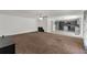 Large living room showing view into adjacent open concept kitchen and dining area at 1905 Emily Blvd, Winter Haven, FL 33884