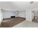 Cozy living room featuring a ceiling fan, neutral paint, and carpeted flooring at 1905 Emily Blvd, Winter Haven, FL 33884