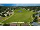 Scenic aerial shot of the community park with green space and walking trails at 2032 Wavyleaf Ct, Apopka, FL 32712