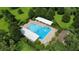 Aerial shot of the community pool with a shaded seating area and lush landscaping at 2032 Wavyleaf Ct, Apopka, FL 32712