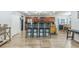 Kitchen featuring a breakfast bar with seating and stainless steel appliances at 2032 Wavyleaf Ct, Apopka, FL 32712