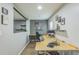 Dedicated home office space with a spacious desk and natural light at 2032 Wavyleaf Ct, Apopka, FL 32712