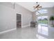 Dining room with pool view, seamlessly connects to bedroom and exterior at 207 Langham Dr, Davenport, FL 33897