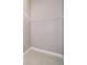 Empty walk-in closet with tile floor and wire shelving ready for storage at 207 Langham Dr, Davenport, FL 33897
