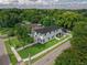 Aerial view of property showcasing lush landscaping and architectural design at 2300 S Brown Ave, Orlando, FL 32806