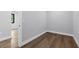 A simple bedroom featuring modern flooring and ample light at 2300 S Brown Ave, Orlando, FL 32806