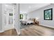 Serene bedroom with hardwood floors, natural light, and a comfortable bed at 2300 S Brown Ave, Orlando, FL 32806