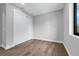 Cozy bedroom showcasing built-in closet space and natural light at 2300 S Brown Ave, Orlando, FL 32806