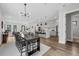 Open floor plan with modern kitchen, dining area, and living room, perfect for entertaining at 2300 S Brown Ave, Orlando, FL 32806