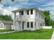Striking two-story home with a clean, modern design and lush lawn at 2300 S Brown Ave, Orlando, FL 32806