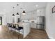 Bright kitchen featuring pendant lights, an island with seating, and stainless steel appliances at 2300 S Brown Ave, Orlando, FL 32806