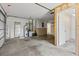 Spacious garage featuring ample storage, utility equipment, and access to additional rooms at 2351 El Prado Ter, Deltona, FL 32725