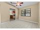Bright and airy living room featuring tile floors and an open floor plan at 2351 El Prado Ter, Deltona, FL 32725
