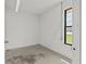 Clean and simple storage room with a window, offering ample space for organizing belongings at 2351 El Prado Ter, Deltona, FL 32725
