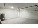 Spacious garage with white walls and gray floor at 2500 Sw 156Th Ln Rd, Ocala, FL 34473