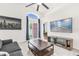 Cozy living room with tile floors, and sliding glass doors to the backyard at 2513 Hickory Oak Blvd, Orlando, FL 32817