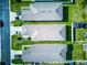 Bird's-eye view of neighborhood homes with well-manicured lawns at 2932 Whispering Trails Dr, Winter Haven, FL 33884
