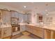 Contemporary kitchen featuring stainless steel appliances, sleek countertops, and modern design at 2932 Whispering Trails Dr, Winter Haven, FL 33884