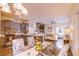 Open concept kitchen flows into the living room, perfect for entertaining at 2932 Whispering Trails Dr, Winter Haven, FL 33884