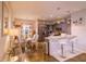 Open concept kitchen with breakfast bar, stainless steel appliances, and modern fixtures at 2932 Whispering Trails Dr, Winter Haven, FL 33884