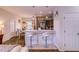 Kitchen with breakfast bar offering a great seating option and stylish design at 2932 Whispering Trails Dr, Winter Haven, FL 33884