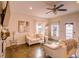 Bright living room featuring neutral tones, stylish furniture, and ample natural light at 2932 Whispering Trails Dr, Winter Haven, FL 33884