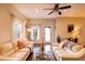 The living room features neutral tones, stylish furniture, and natural light at 2932 Whispering Trails Dr, Winter Haven, FL 33884