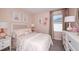 Lovely pink bedroom with ballerina theme decor, perfect for a young girl at 325 Cornerstone Dr, Groveland, FL 34736