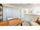 Upstairs loft with work space, chair, and storage at 325 Cornerstone Dr, Groveland, FL 34736
