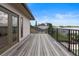 Outdoor balcony with scenic views of the lake, manicured lawn, and surrounding neighborhood at 3604 Shell Cove Ln, Orlando, FL 32817