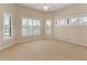 Bedroom featuring neutral carpet, plantation shutters on multiple windows, and a ceiling fan at 3604 Shell Cove Ln, Orlando, FL 32817