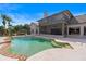 Inviting backyard pool with lake views, lush landscaping, and an outdoor lanai at 3604 Shell Cove Ln, Orlando, FL 32817