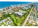 Scenic aerial view of a beachfront condominium complex with golf course and ocean views at 4 Oceans West Blvd # 502D, Daytona Beach Shores, FL 32118