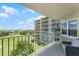Relax on this condo's balcony overlooking a golf course, a serene setting for unwinding and enjoying the picturesque views at 4 Oceans West Blvd # 502D, Daytona Beach Shores, FL 32118